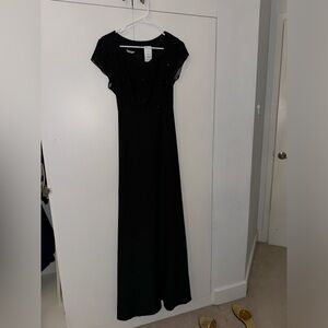 Long black evening gown size 12 never worn with tags